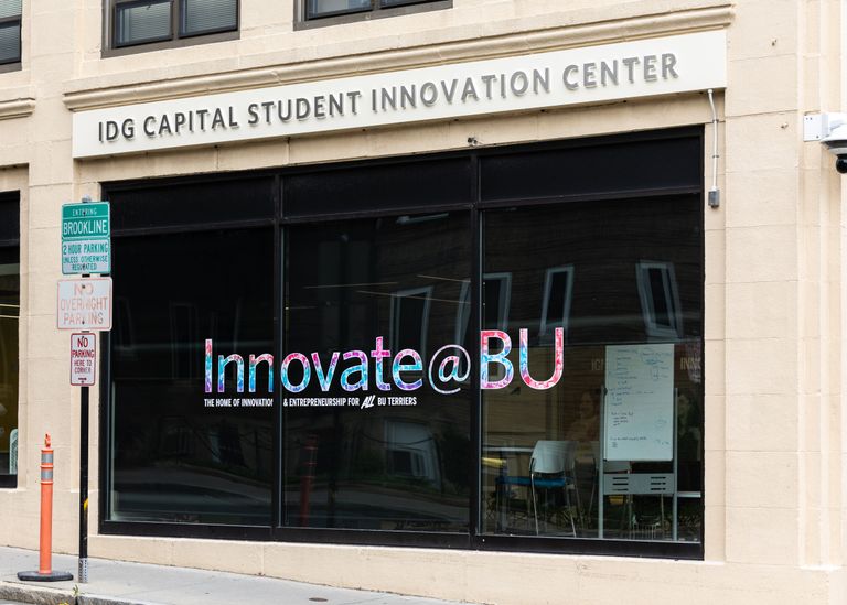 IDG Capital Student Innovation Center signage above a window with Innovate@BU vinyl decal