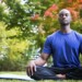 Man meditating outside