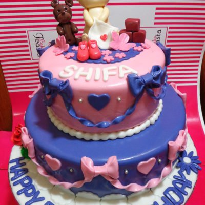 Ribbon 1st Birthday Cake in lahore