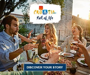 People enjoying a meal and drinks at an outdoor table with Croatia Full of Life text