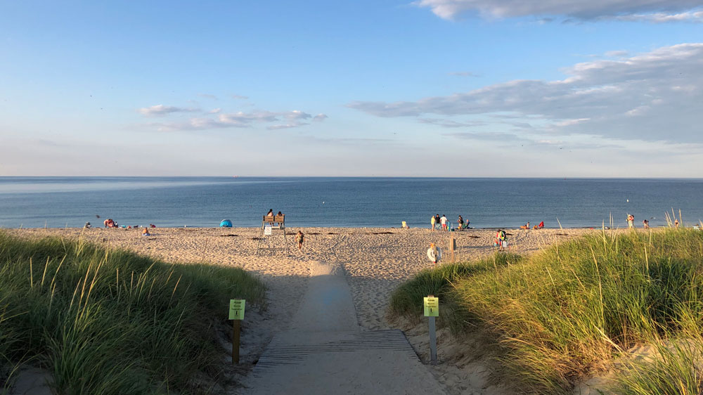 A path through the dunes leads to Scusset Beach in Sandwich, Cape Cod.