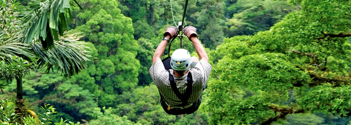 take a zipline adventure through rain forests in limon