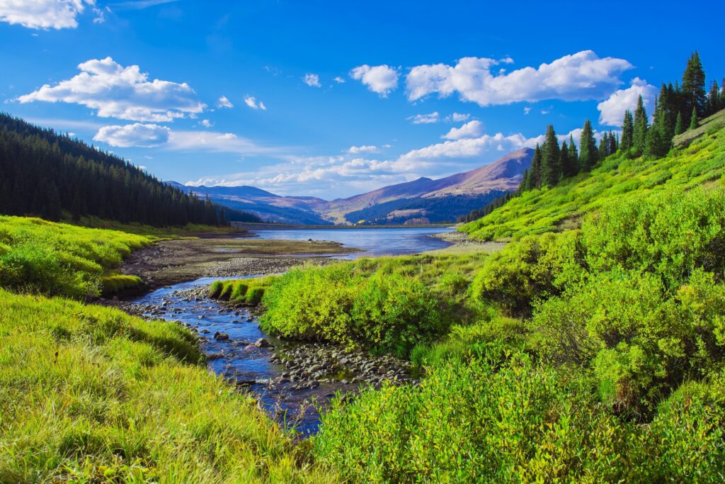 Mountain valley with flowing spring water