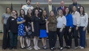 The first round of graduates of the Catholic Educational Leadership Cohort pictured with Superintendent Jim Rigg (back, middle) and David Armstrong (back, right) at graduation celebration on Jan. 10, 2025.