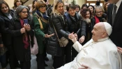 Pope Francis greets members of the Interprovincial Order of the Profession of Midwifery of Catanzaro on Feb. 6, 2025, at his Casa Santa Marta residence at the Vatican.