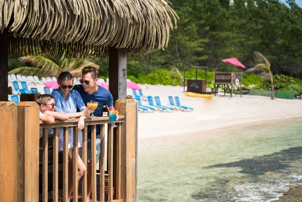 People sightseeing from a beach in Grand Cayman