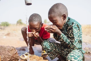 poverty children drinking water