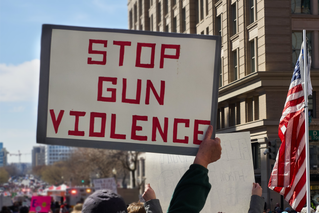 stop gun violence rally sign