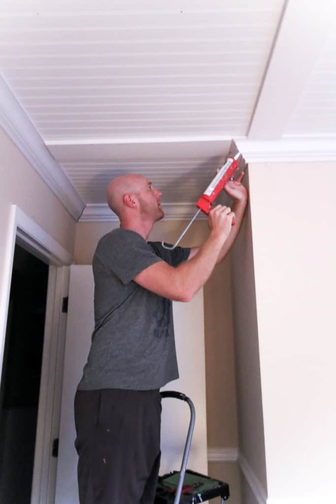 Caulking molding on ceiling