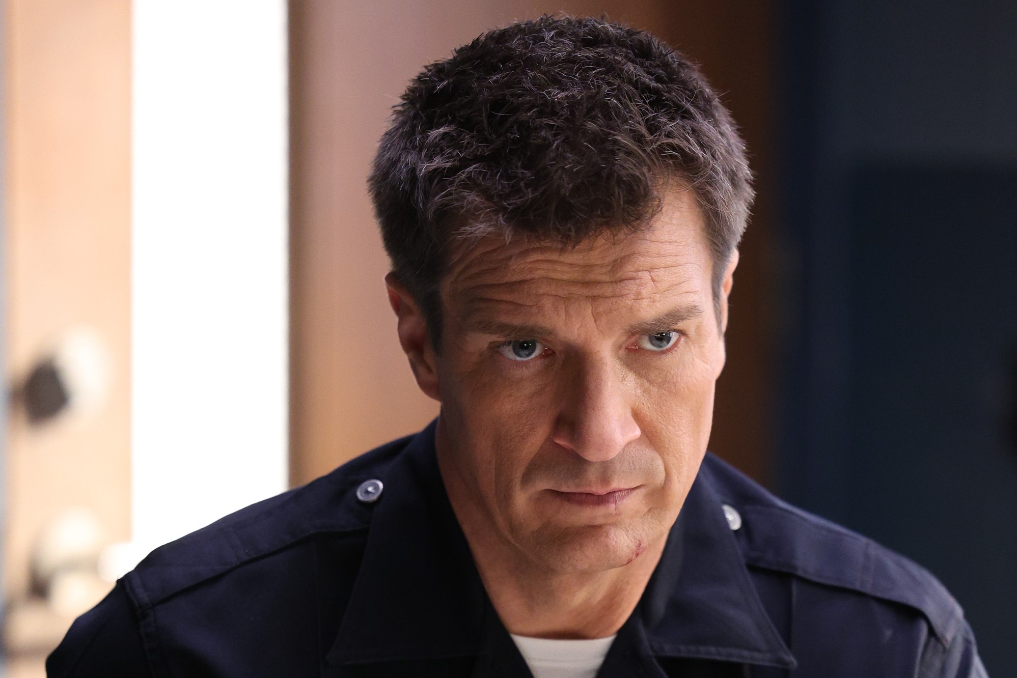 Nathan Fillion as John Nolan