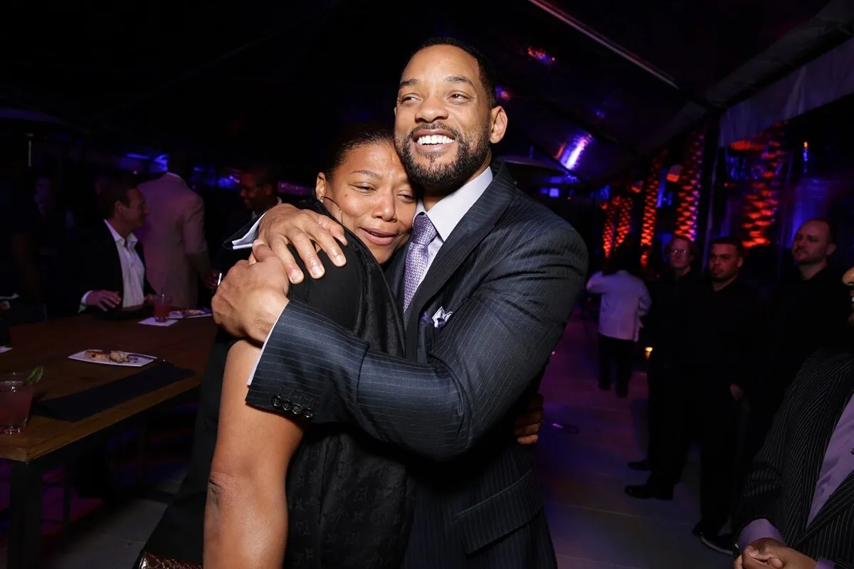 Will Smith hugging Queen Latifah at the premiere of 'Focus'.