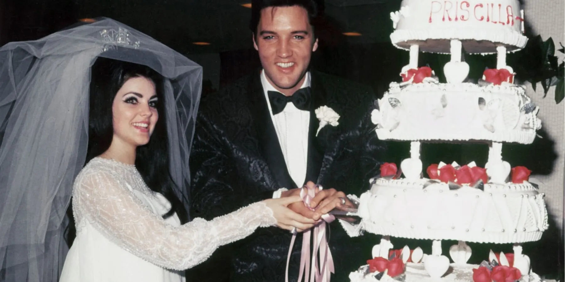 Priscilla Presley and Elvis Presley on their wedding day