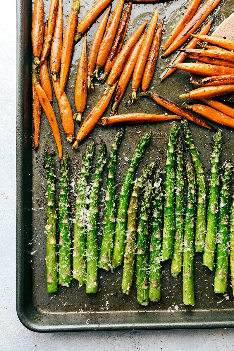 Image of the sheet pan with carrots and asparagus that goes with this easter dinner meals