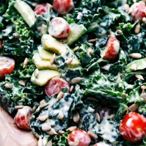 Mouth-watering kale salad with avocado, presented beautifully and ready for serving.