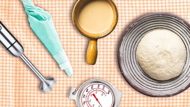 various kitchen tools on checkered cloth