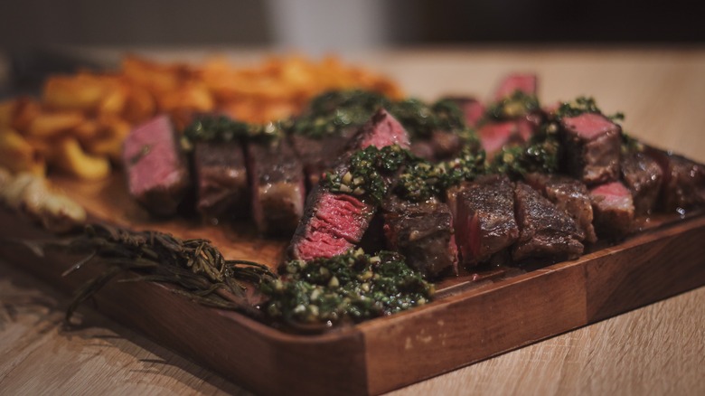 Sous vide steak with garlic and rosemary