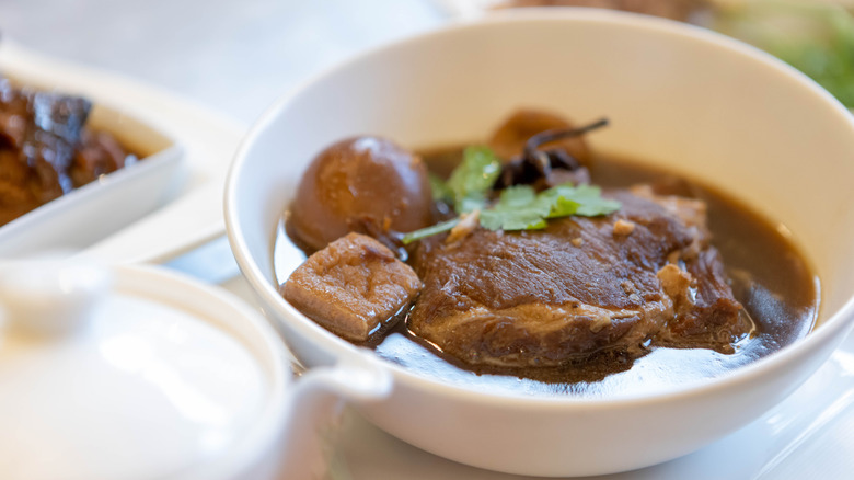 Pork soup in a white bowl