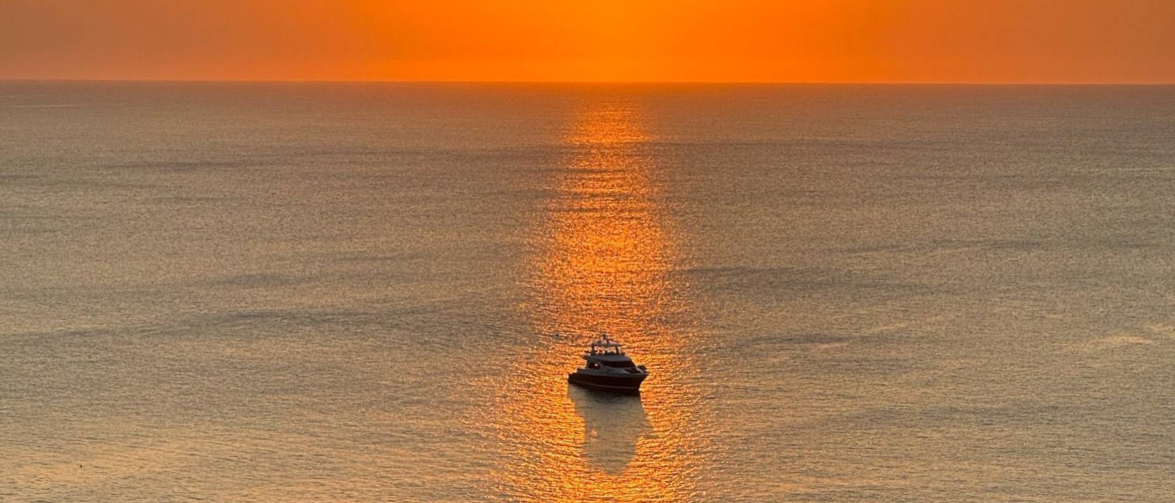 SUNSET AT SEA