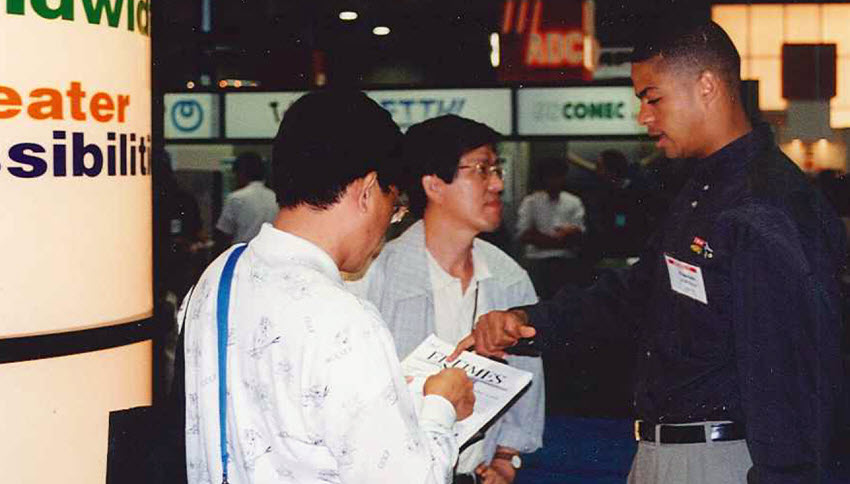 Francois Locoh-Donou Ciena booth NFOEC 1997