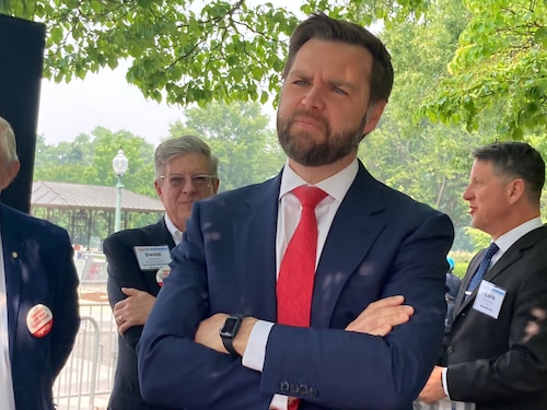 JD Vance prepares to speak at a Capitol Hill press conference.