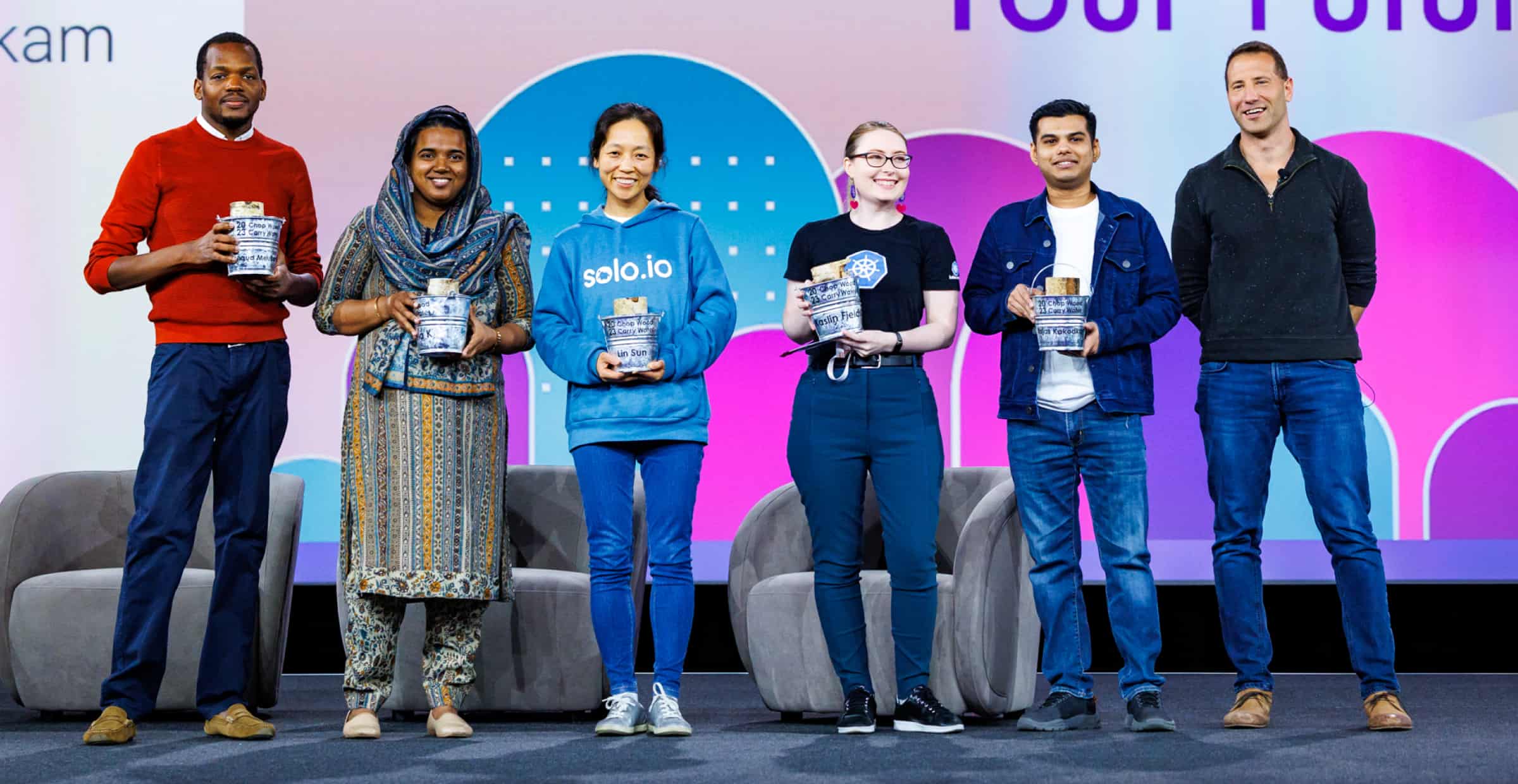 All award recipients on a stage