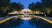 Williamsburg Inn exterior at night featuring pool