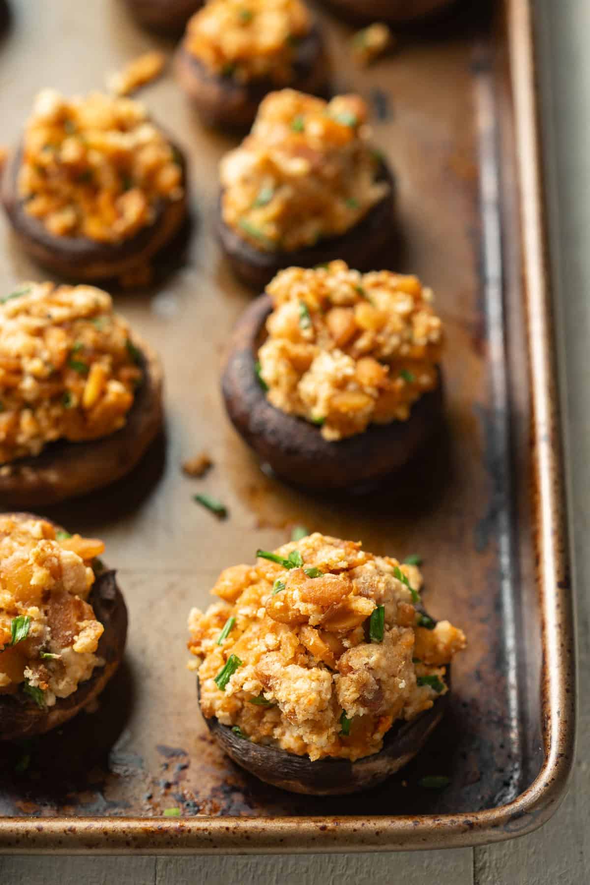 Vegan Stuffed Mushrooms on a baking sheet.