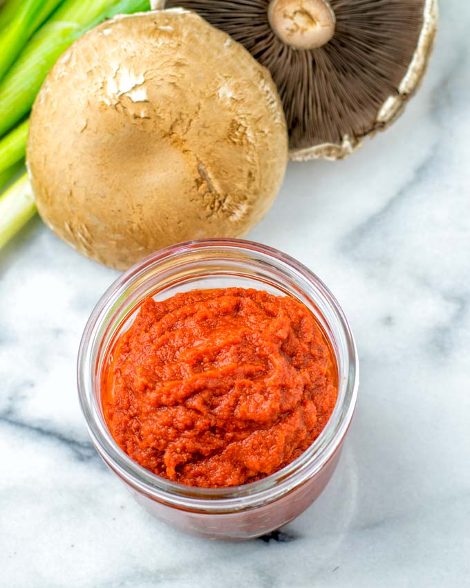 To make this Red Curry Paste you need tomato paste, minced garlic. onions, red chilis, and a spice mix.