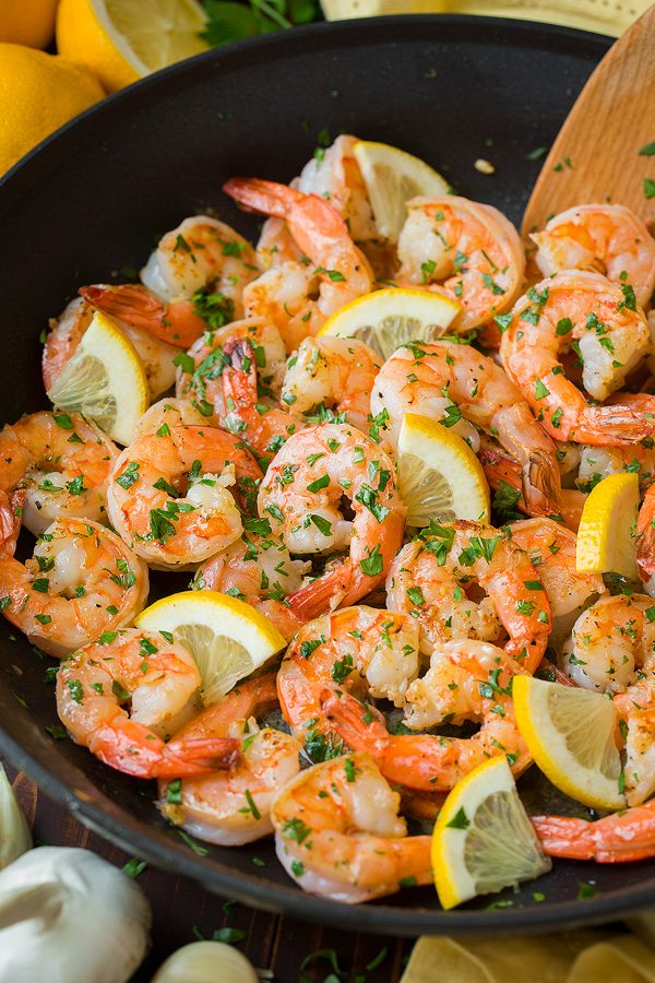 Shrimp in skillet after cooking. Tossed with garlic, lemon and butter.