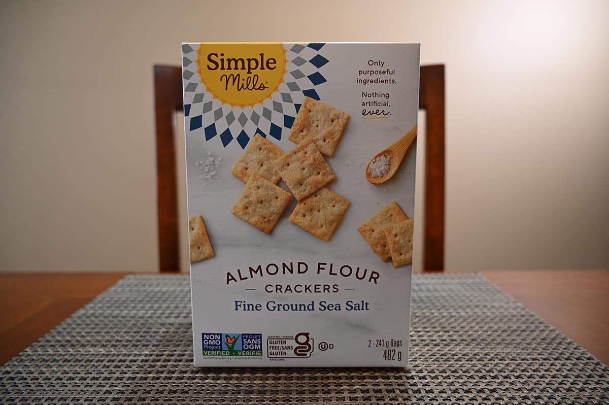 Image of a box of Simple Mills Almond Flour Crackers sitting on a table unopened.