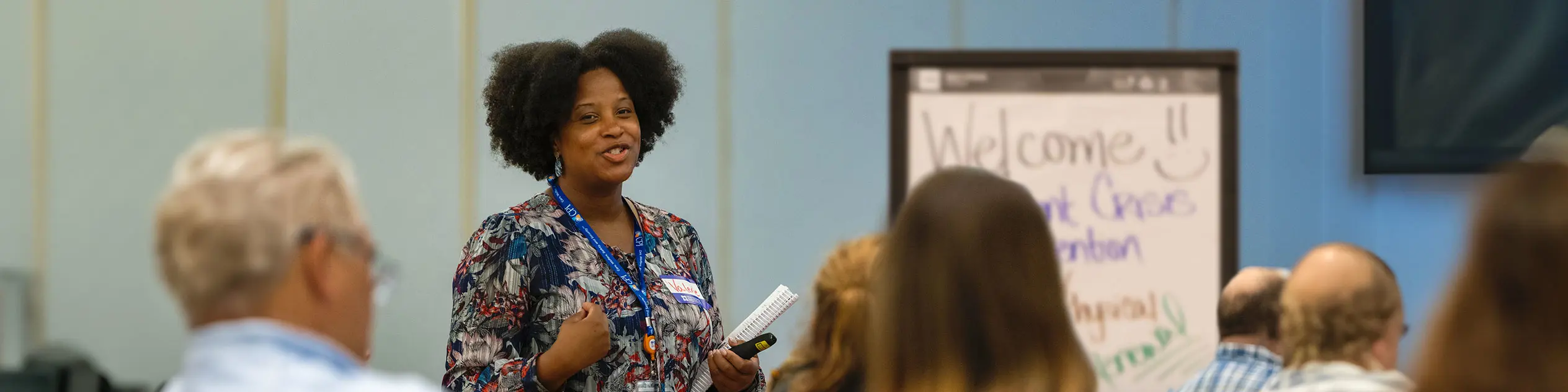 A woman leading a CPI training.