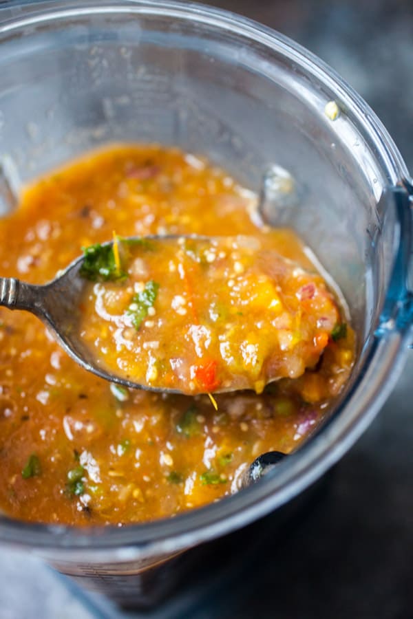 Easy grilled salsa with fresh tomatoes, tomatillos, onions, and sweet peppers. All charred on a grill and blended together. The best salsa you'll have this summer and easy to make!