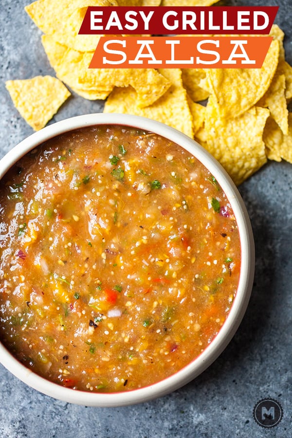 Easy grilled salsa with fresh tomatoes, tomatillos, onions, and sweet peppers. All charred on a grill and blended together. The best salsa you'll have this summer and easy to make!