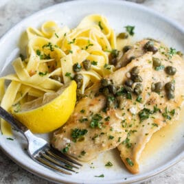 A plate of chicken scallopini.