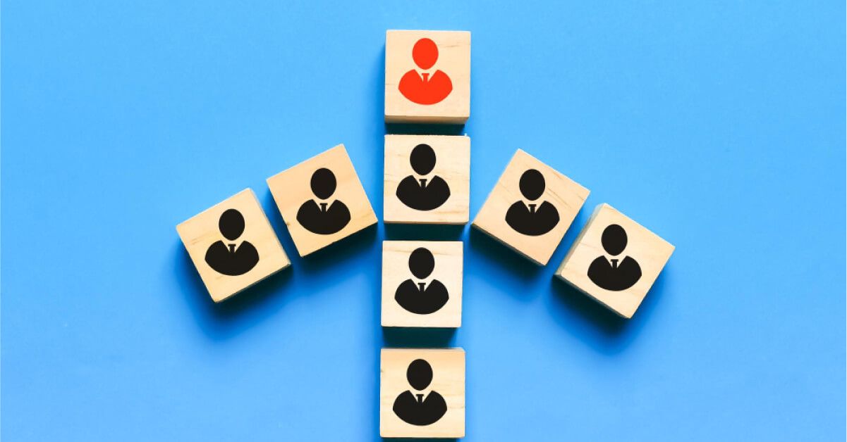 Wooden cubes with people symbols