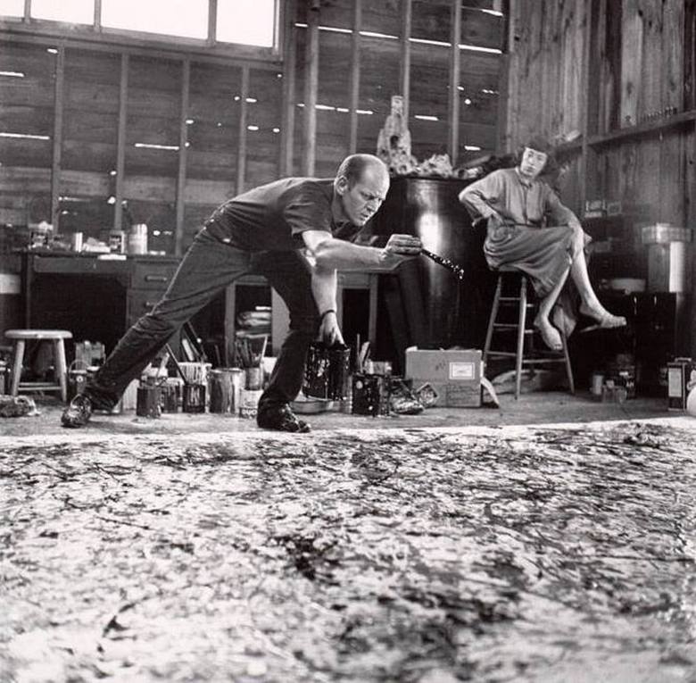 Abstract Expressionism : Jackson Pollock paints One and Lee Krasner observes, 1950. Photographed by Hans Namuth.