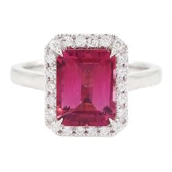 18ct white gold emerald cut tourmaline and round brilliant cut diamond cluster ring, hallm...