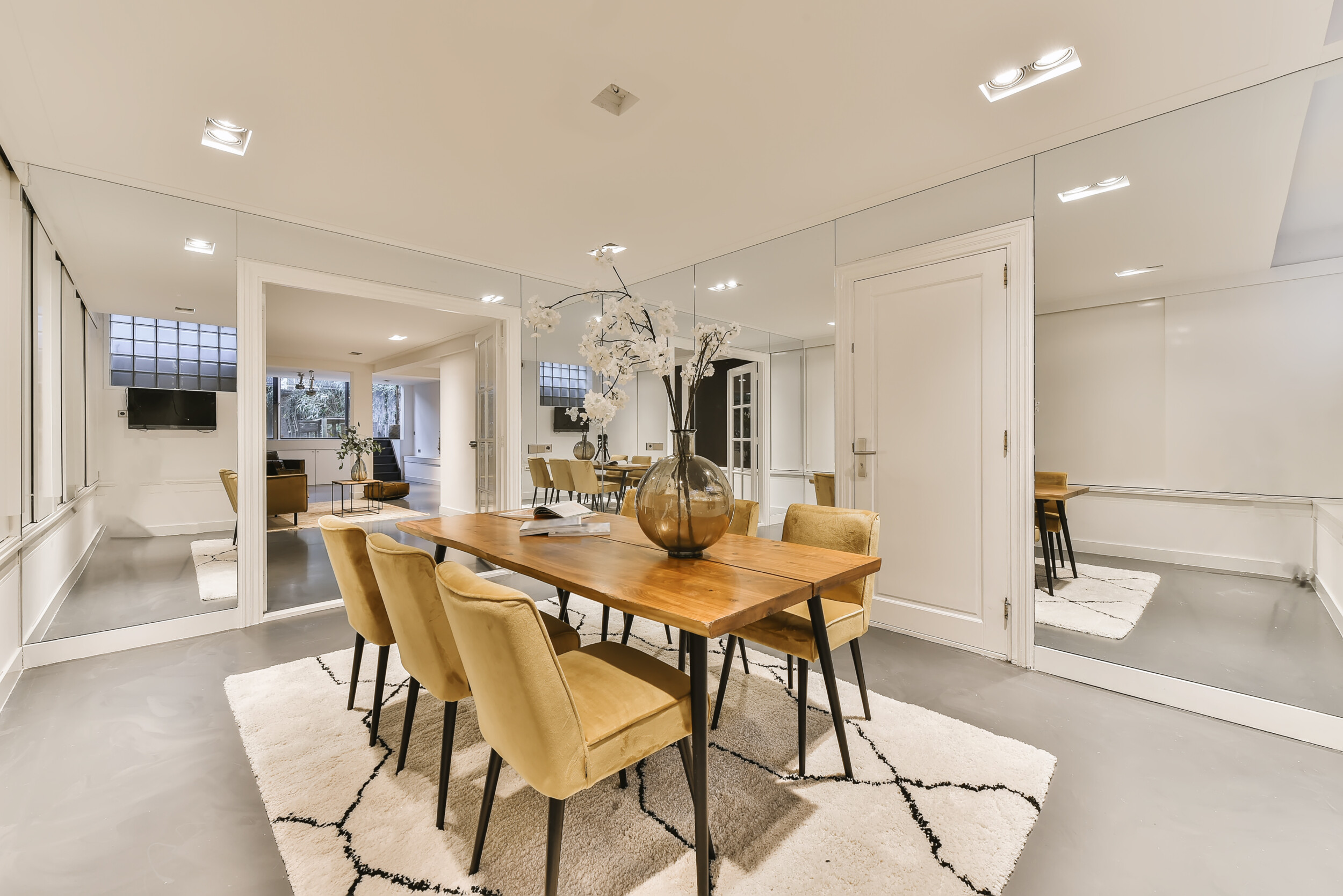 modern dining room with large floral decor