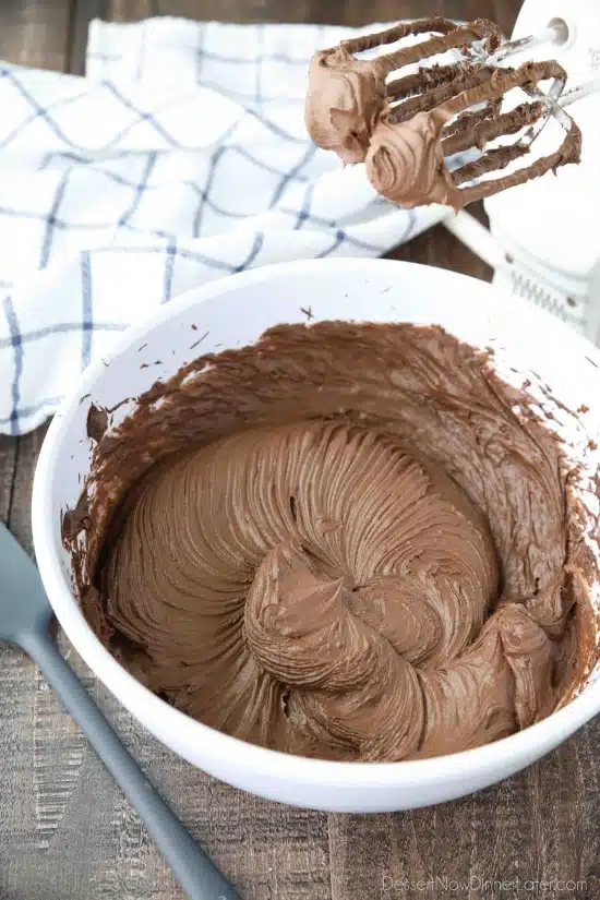 This is the BEST Chocolate Cream Cheese Frosting! Silky smooth and creamy, yet thick and sturdy enough for piping on cakes or cupcakes. It’s super easy to make and not too sweet.