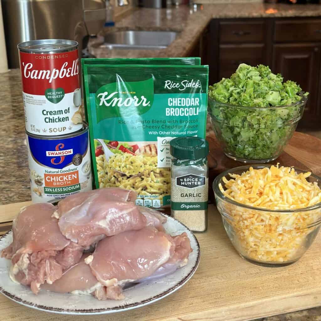 The ingredients to make cheesy broccoli chicken and rice casserole.