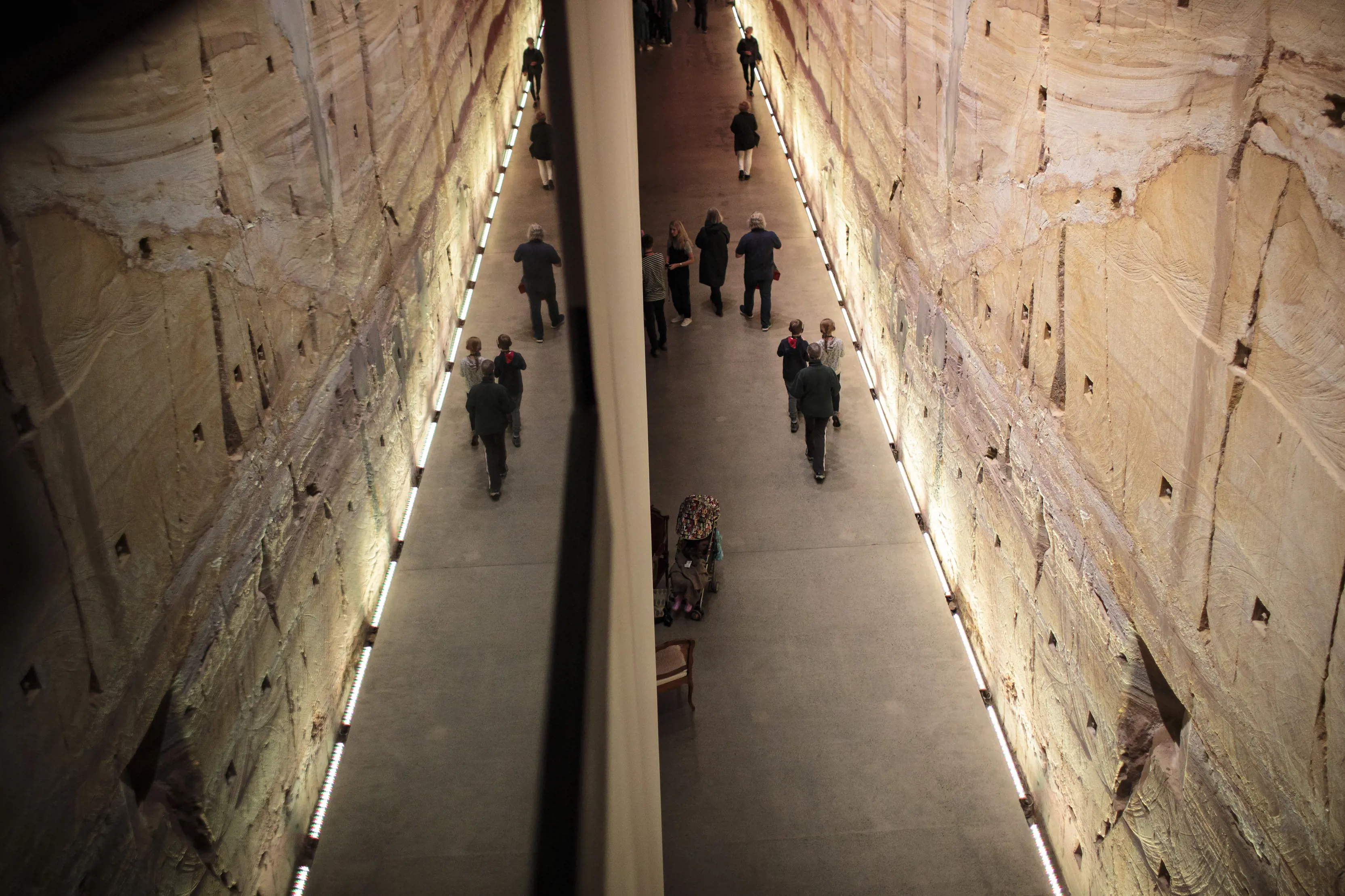 Aerial shot of people at The Void, a cocktail bar buried seventeen metres underground at The Museum of Old and New Art.