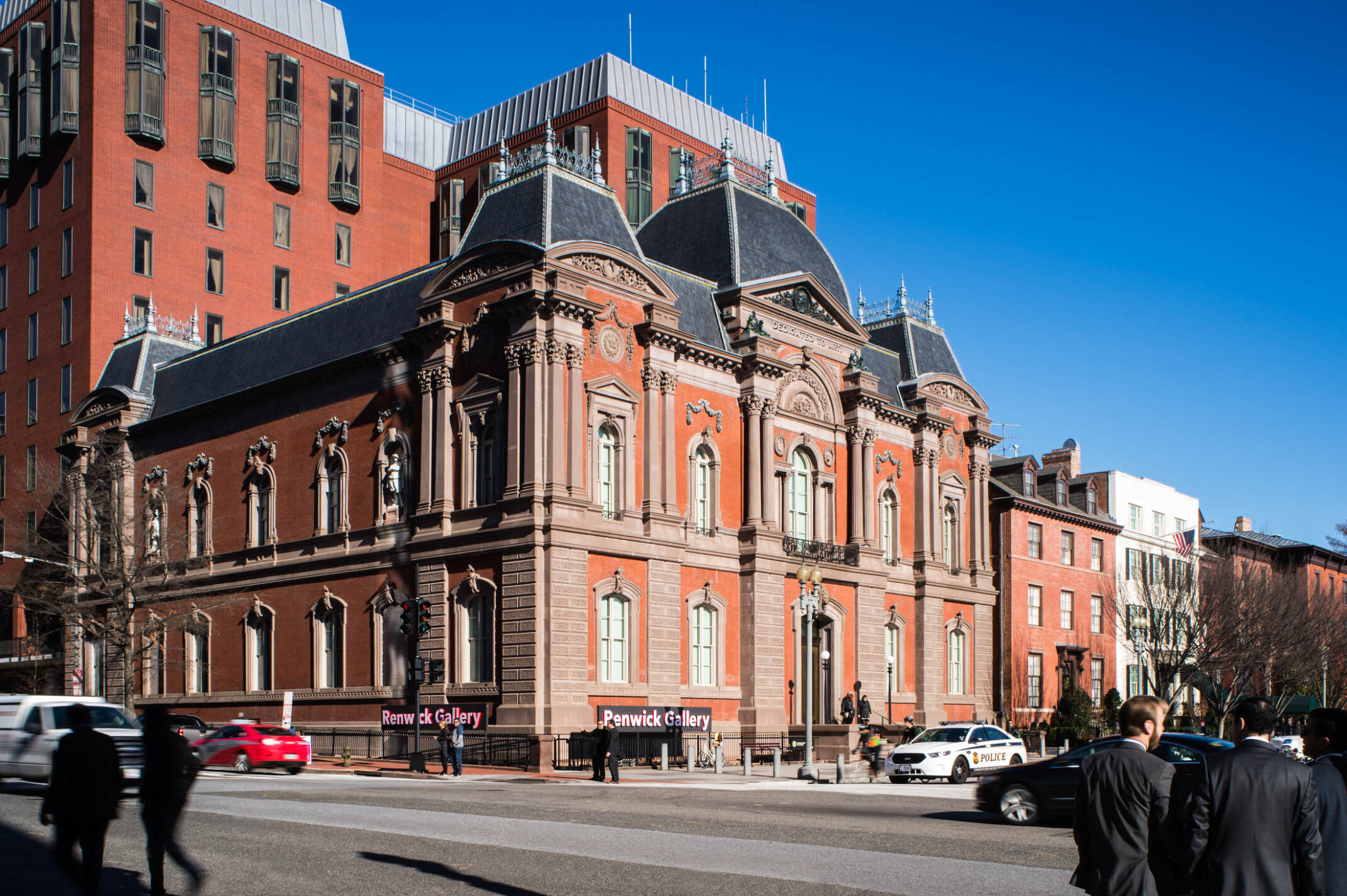 Exterior corner view of Smithsonian American Art Museum's Renwick Gallery from across a busy street