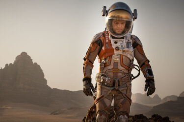 An astronaut on barren landscape, Disney Plus-like.