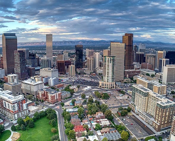 denver skyline with rocky mountains in the background 