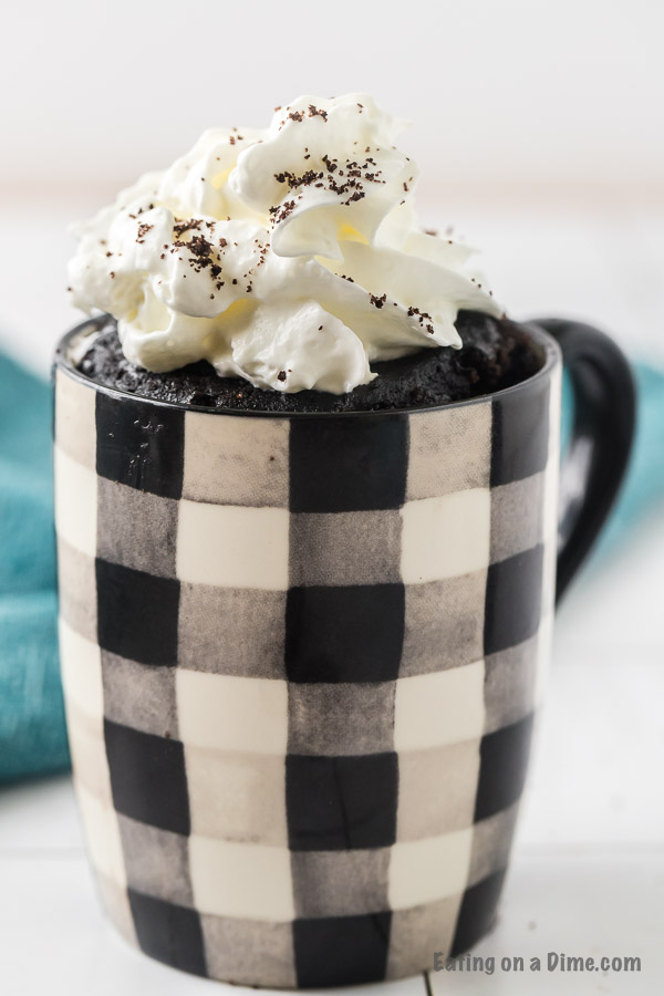 mug cake topped with cool whip