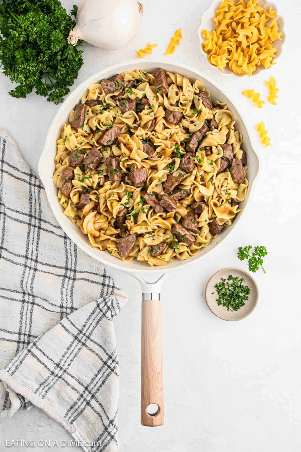 Beef Tips and noodles in a skillet