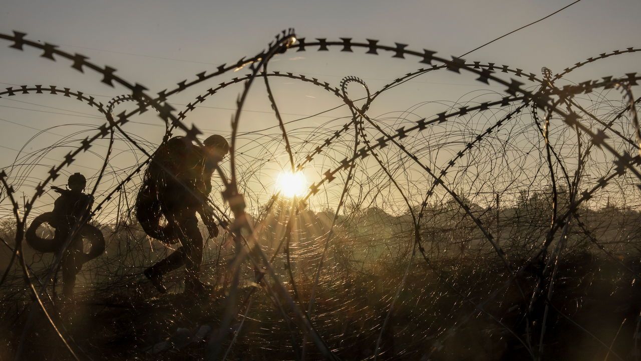 FILE - In this photo provided by Ukraine's 24th Mechanised Brigade press service, servicemen of the 24th Mechanised Brig