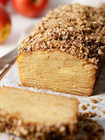 invisible apple cake on a board.