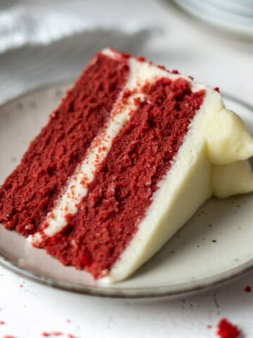 A slice of cake in a plate.