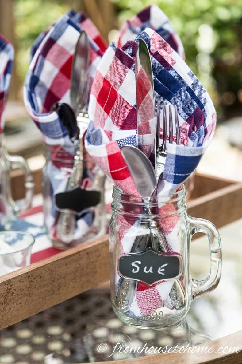 Cutlery and patriotic napkins in a mason jar